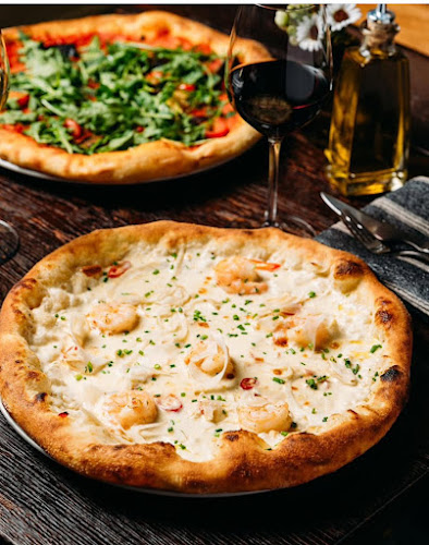 Opinii despre La Famiglia Helsinki în Helsinki - Ravintola-ala