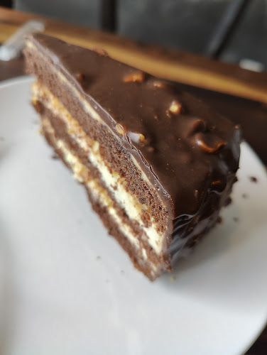 Cafe Herkutella Phone number