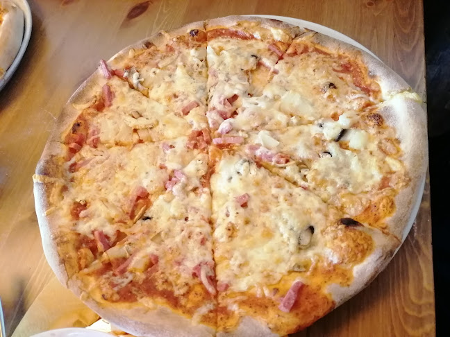 Opinii despre Vartiokylä Pizzeria în Helsinki - Ravintola-ala