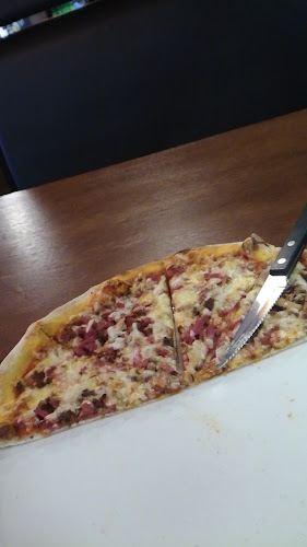 Manu Pizzeria Phone number